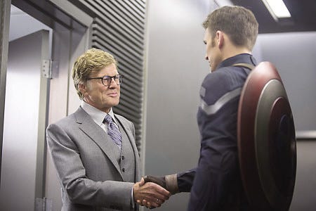This image released by Marvel shows Robert Redford, left, and Chris Evans in a scene from "Captain America: The Winter Soldier." (AP Photo/Marvel-Disney)