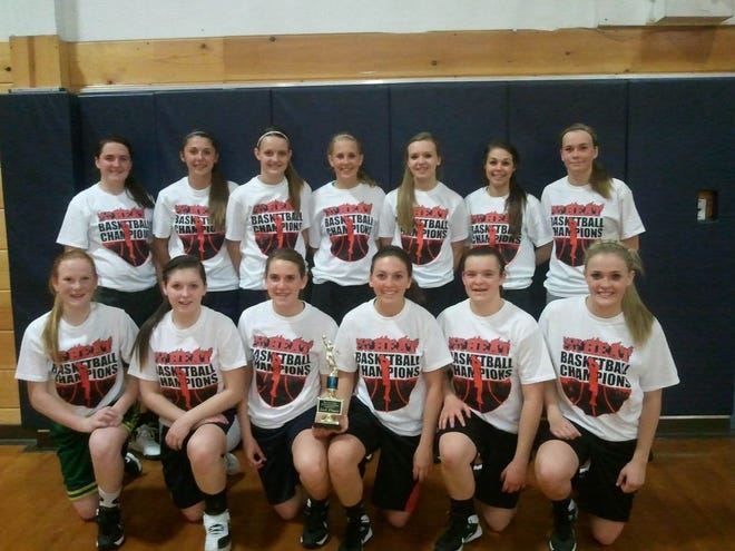 The Siskiyou Slam JV Girls AAU basketball team pose with their second place trophy while wearing their championship T-shirts recently. Submitted Photo