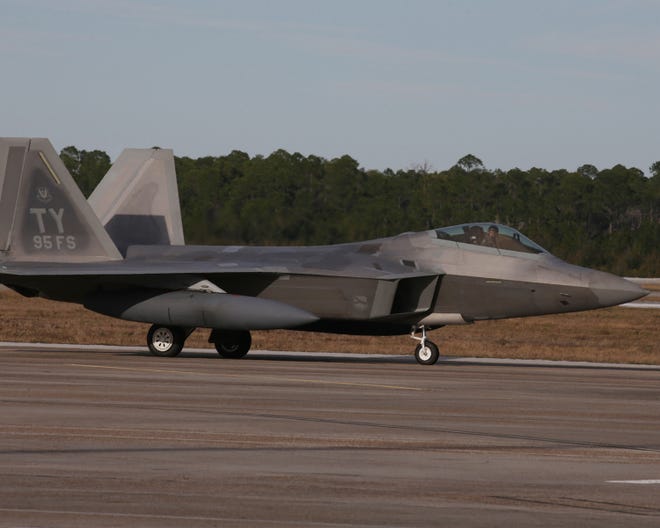 An F-22 lands at Tyndall Air Force Base in January. This week, the final jets arrived.