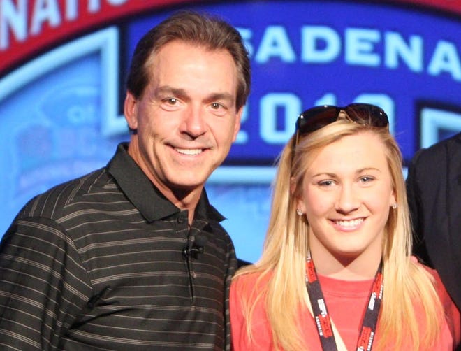 Alabama Coach Nick Saban, left, and daughter Kristen Saban pose for a picture during a press conference at the ESPN Zone at Disney Land in Anaheim, Ca. Saturday, Jan. 2, 2010. (Dusty Compton / Tuscaloosa News)