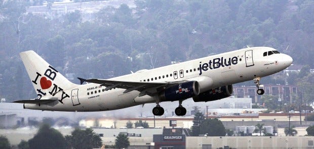 A JetBlue flight takes off from Long Beach Airport in Long Beach, Calif., Tuesday, Oct. 25, 2011. (AP Photo/Reed Saxon)