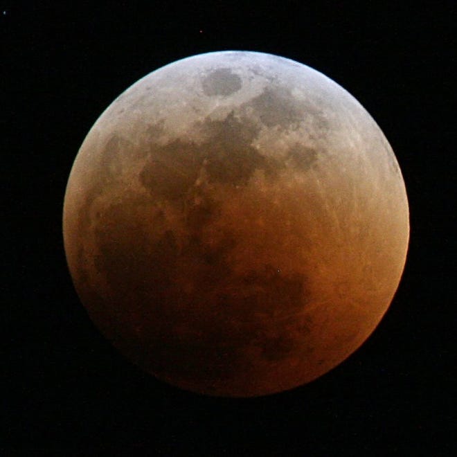 The beginning of a "blood moon" in June 2011. Photo by Muhammad Mahdi Karim.