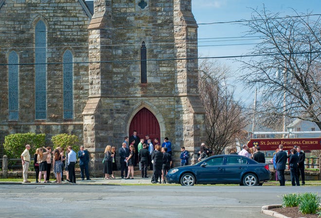 People arriving Monday to St. James Episcopal Church for the funeral of Goshen High School senior Lance Golubinski, 18, who died Wednesday night in a car crash.