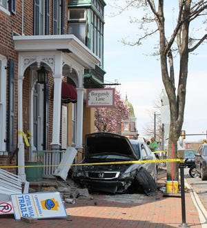 A car ran into the front porch of Burgundy Lane Bed and Breakfast at 128 W. Main St., Waynesboro, around 11:35 a.m. Sunday. Additional information about the accident was not available this morning. TOYA McCLEARY/THE RECORD HERALD
