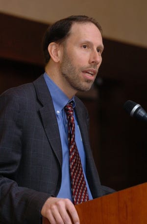 Doctor Jeffrey Brenner, Director of the Institute of Urban Health at Cooper University Hospital in Camden, speaks at the 2012 Community Support Campaign Kick Off Breakfast at the Crown Plaza Hotel in Cherry Hill on Thursday.