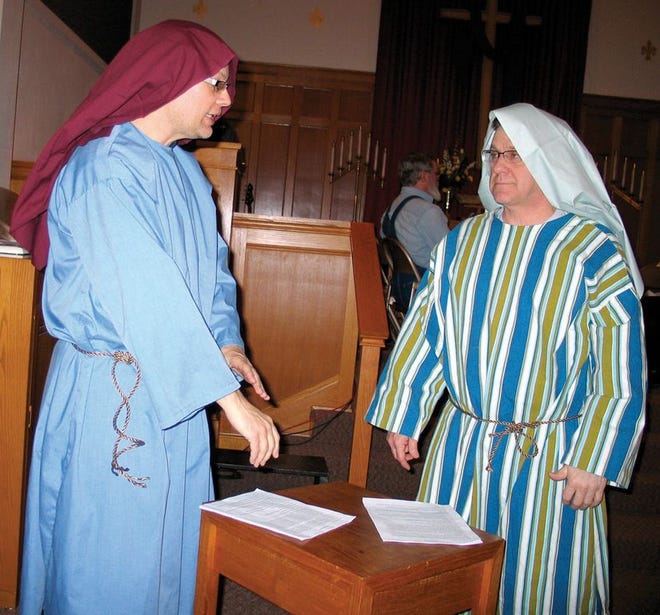 Nathan Gray, left, portraying Peter and Dave Blunier portraying John practice for the drama “In Remembrance,” which shows the humanity of Jesus' disciples around the time of The Last Supper.