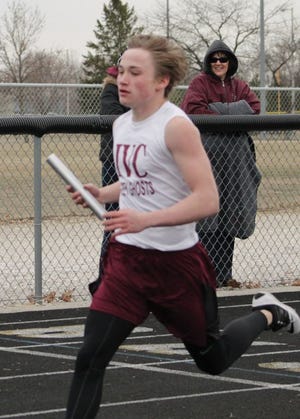 Freshman Robbie Hunt runs in a relay race at home earlier this season.