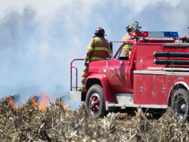 Firefighters with the Central Warren Fire District arrive at the scene of a brush fire Friday near 160th Avenue, outside of Monmouth. Local authorities have responded to numerous field fires over the past week because of windy and dry conditions. PHOTO COURTESY OF BRUCE MORATH