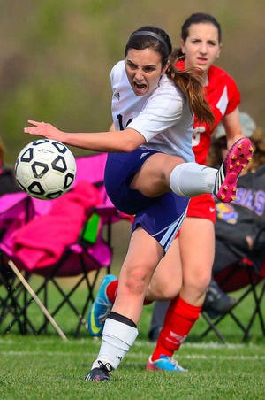 Hayden's Grace Kinman takes a shot at the goal against Shawnee Heights Tuesday evening at Hayden.