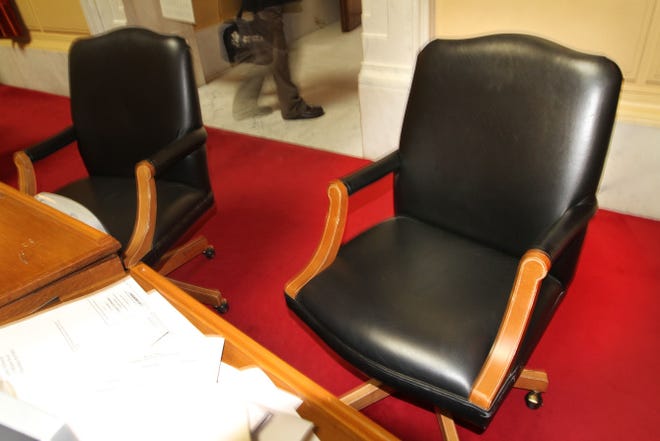 The seat in the House chamber newly assigned to former Speaker Gordon Fox, who has been absent from the legislature since March 21.