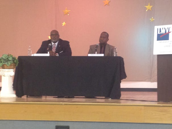 Jonathan Barfield and Walter Martin Jr. face the crowd during a forum on Wednesday.