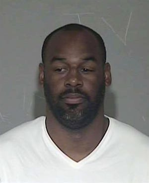 In a photo provided by the Maricopa County Sheriff's Office, former NFL quarterback Donovan McNabb appears in a photo at jail. McNabb has been released from an Arizona jail after serving a one-day sentence for a DUI arrest late last year. Records released by West Mesa Justice Court show the 37-year-old McNabb served his time Wednesday and was released Thursday morning. McNabb was arrested Dec. 15 on the Salt River Pima-Maricopa Indian Community. He pleaded guilty on March 27 and nine days of his sentence was suspended.