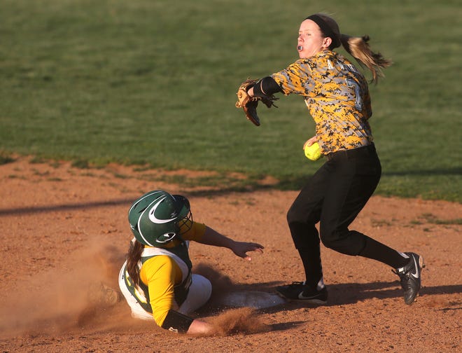 Kings Mountain's Ashton Withers forces out Crest's Savannah Howard during the Lady Mountaineers' 12-4 win Thursday.