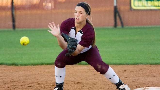 Bastrop’s Rachel West reaches to catch a throw on the bag during the Bears’ season finale against Georgetown on April 17. Alexander Scott for Bastrop Advertiser