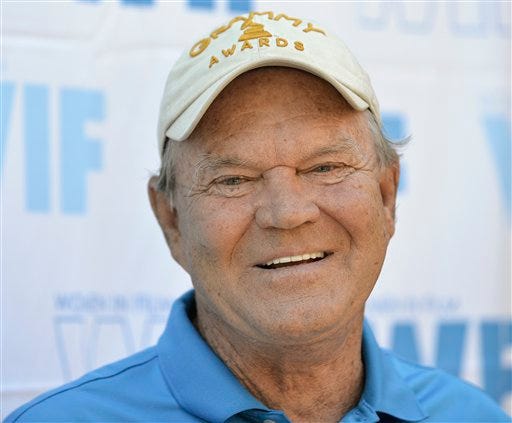 Glen Campbell arrives at the 16th Annual Women in Film Malibu Golf Classic at the Malibu Country Club on Saturday, July 13, 2013 in Malibu, Calif. (Photo by Richard Shotwell/Invision/AP)