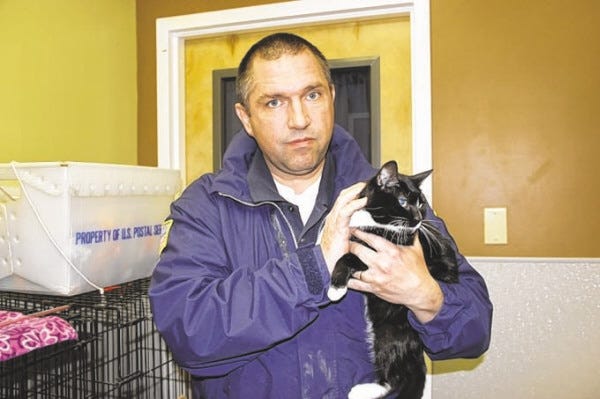 Peggy Aulisio/Advocate
Fairhaven's animal control officer, Terry Cripps, holds Tulip.