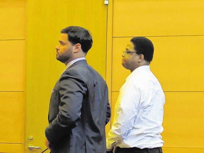 David Stevenson, right, and his lawyer, Jaime Santana, listen Thursday in Orange County Court as a jury pronounces Stevenson guilty or murder, arson, weapon possession and animal cruelty in the 2013 death of TyRochelle Haughton in Port Jervis. The family dog also died in a fire set after the homicide.
