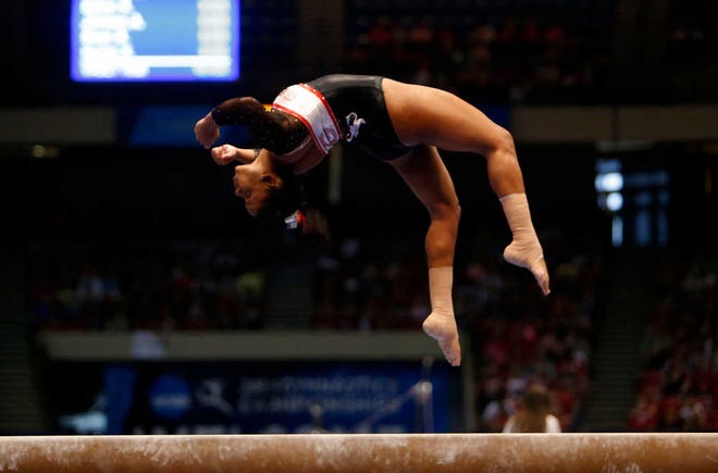 Georgia's Kaylan Earls competes on beam during the NCAA Women's Gymnastics National Championship at the BJCC in Birmingham, Ala. Saturday, April 19, 2014. The Tuscaloosa News | Kirsten Fiscus