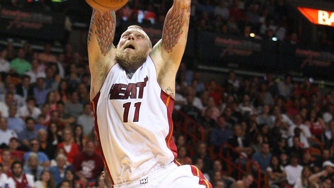 “He’s a live wire,” coach Erik Spoelstra says of reserve center Chris ‘Birdman’ Andersen. “It’d be pretty selfish of anyone to watch him play the way he does and not pick up on it himself.” (Hector Gabino/El Nuevo Herald/MCT)