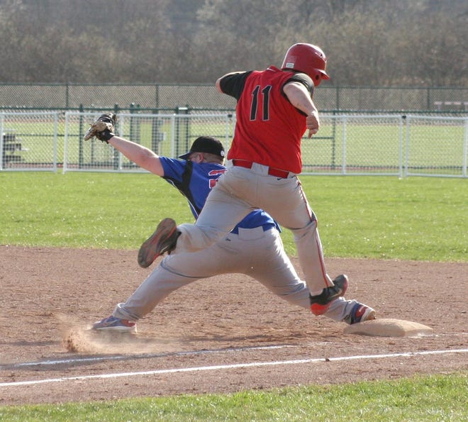 Campbell-Savona first baseman Jake Nichols stretches for the throw to get Canisteo-Greenwood’s Josh McGregger out Monday. Shawn Vargo/The Leader