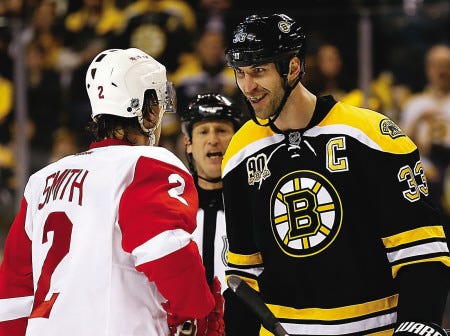 Boston Bruins defenseman Zdeno Chara (33) stares at Detroit Red Wings’ Brendan Smith during the first period of Game 2 of their first-round playoff series in Boston on Sunday. The two glared, but did not fight.