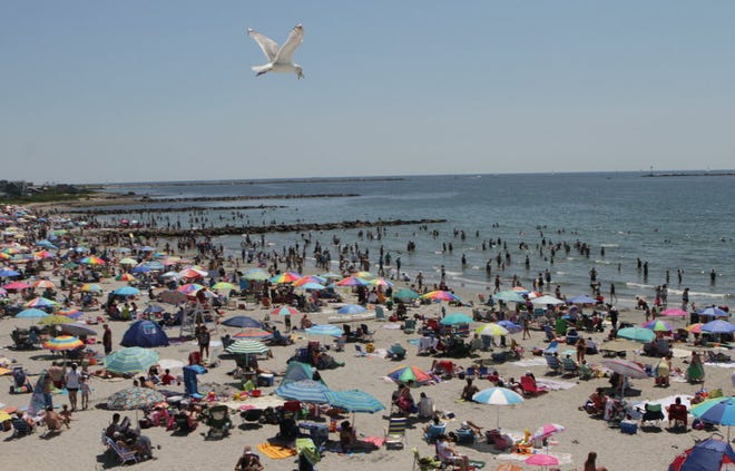 A near-capacity crowd at Sand Hill Cove, aka Roger Wheeler State Beach in Narragansett, in this 2011 photo.