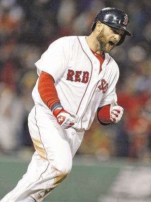 Michael Dwyer/THE ASSOCIATED PRESS
Jonny Gomes reacts to his three-run home run in the sixth inning against the Baltimore Orioles in Boston on Sunday. Boston won 6-5.