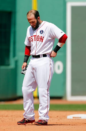Boston's Dustin Pedroia hangs his head Monday after being doubled off of second base to end the fifth inning in the Red Sox' 7-6 loss. THE ASSOCIATED PRESS