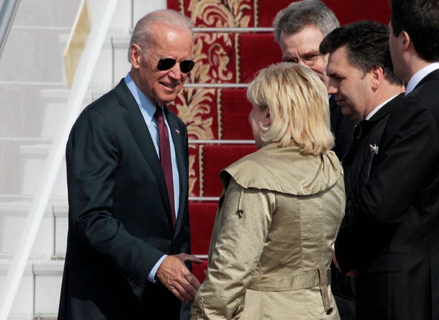 THE ASSOCIATED PRESS / U.S. Vice President Joe Biden , left, is greeted upon arrival at Borispol airport outside Kiev, Ukraine, Monday April 21, 2014. U.S. Vice President Joe Biden will meet with Ukraine's acting president, Oleksander Turchinov, and Prime Minister Arseny Yatseniuk on Tuesday, during a visit to Kiev. (AP Photo/Sergei Chuzavkov) 
 THE ASSOCIATED PRESS / U.S. Vice President Joe Biden waves as he arrives at Borispol airport outside Kiev, Ukraine on Monday April 21, 2014. Vice President Joe Biden on Monday launched a high-profile visit to demonstrate the U.S. commitment to Ukraine and push for urgent implementation of an international agreement aimed at de-escalating tensions even as violence continues. Biden planned to meet Tuesday with government leaders who took over after pro-Russia Ukrainian President Viktor Yanukovych was ousted in February following months of protests. The White House said President Barack Obama and Biden agreed he should make the two-day visit to the capital city to send a high-level signal of support for reform efforts being pushed the new government. (AP Photo/Sergei Chuzavkov) 
 THE ASSOCIATED PRESS / A Ukrainian soldier stands guard near an armored personnel carrier at Boryspil airport outside Kiev, Ukraine on Monday April 21, 2014.  U.S. Vice President Joe Biden on Monday launched a high-profile visit to Ukraine to demonstrate the U.S. commitment to Ukraine and push for urgent implementation of an international agreement aimed at de-escalating tensions even as violence continues.(AP Photo/Sergei Chuzavkov)