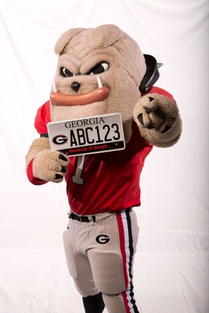 UGA is releasing-through the Georgia Department of Revenue-a new, sleeker version of its specialty state of Georgia license plate featuring the university's iconic "power G." The UGA specialty tags will help raise money for need-based scholarships.