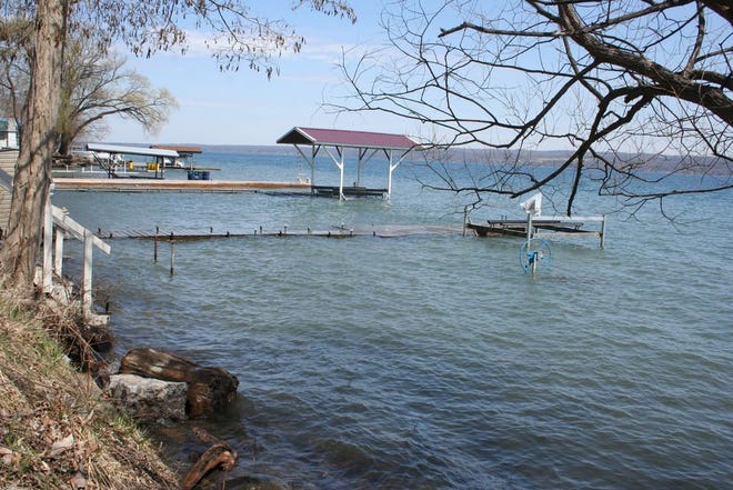 These docks north of Plum Point are nearly submerged, and the stairs that normally lead to a beach now lead directly to Seneca Lake.