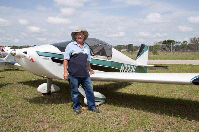 Theodore Weiss is shown with his small airplane in this photo provided by the Citrus County Sheriff's Office. Pilot and plane are still missing.