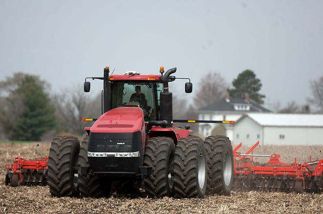 A farmer plows a field near Knoxville on Monday morning. While area soil conditions are not ideal, they are suitable for planting to get underway. STEVE DAVIS/GATEHOUSE MEDIA ILLINOIS