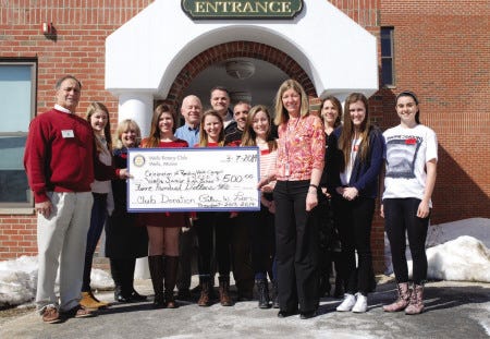 From left, Wells Rotary President Peter Leon, Anna Furness, Suzanne Ilsley, Anna Olsen, Rick Goodrich, Ally O’Brien, Ryan Liberty, George Raftopoulos, Meghan Young, Cindy Roche, Karyn Morin, Stephanie Woods and Melanie Godin.