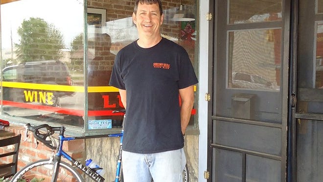 Rob Remlinger, owner of The Back Door Caf , poses for a photo outside his restaurant. The Back Door Caf , located at 117 Main St., is the Chamber business of the week.