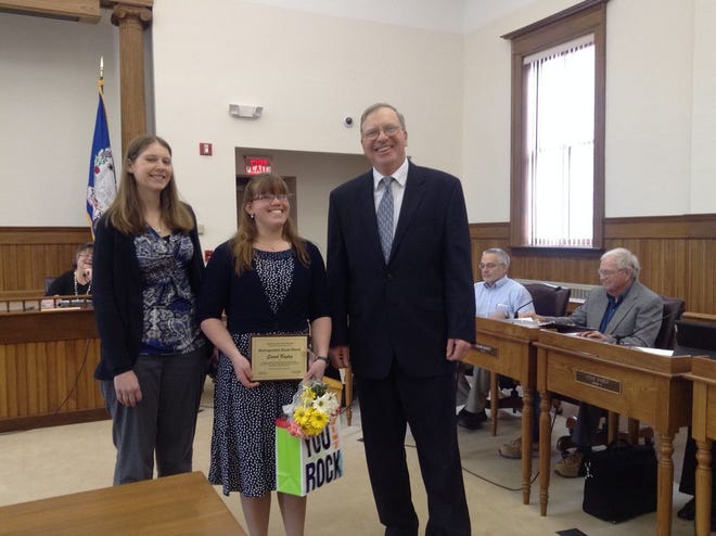 Yates County Distinguished Youth Sarah Bagley (center) with Jennifer Clancey of Cornell Cooperative Extension and Legislative Chairman Timothy Dennis.