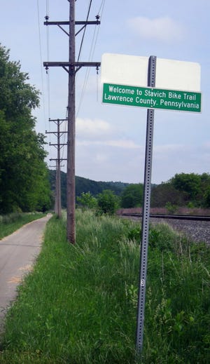 A sign greets trail users as they enter Ohio and exit Pennsylvania. (Bob Downing/Akron Beacon Journal)