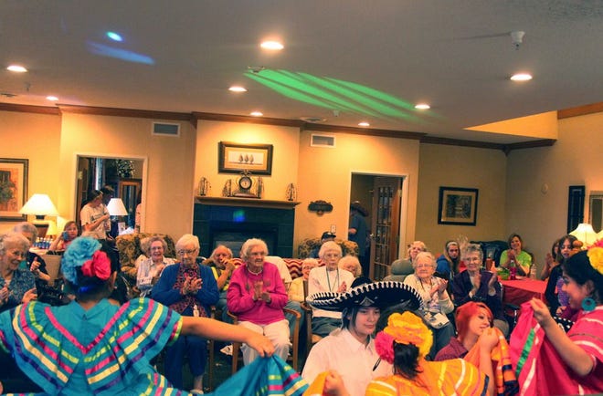 Petersen Healthcare's Legacy Estates of Monmouth, 1200 W. Broadway, celebrated Supportive Living Week last week. The colorful dance group Mexico Lindo, out of Galesburg, performed for tenants at the fiesta celebration open house held Thursday evening. COURTESY PHOTO