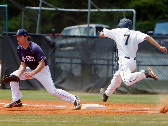 Tuscaloosa Academy’s Dustin Jenkins (7) leaps safely to first base before Lee-Scott’s Trey Adkins gets the throw during Friday’s game at Tuscaloosa Academy.