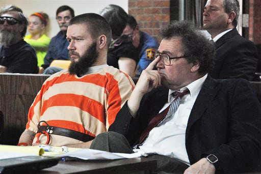 Kyle Flack, left, of Ottawa,sits with his court-appointed lawyer, Ronald Evans, head of the Kansas Death Penalty Defense Unit in Topeka, during a hearing in Franklin County District Court. Flack, 28, is charged with capital murder and other charges in the slaying of four people, including an 18-month-old girl, at a farm outside of Ottawa. An evidentiary hearing in Flack's case, as well as multiple court documents, have been sealed to the public and the media.