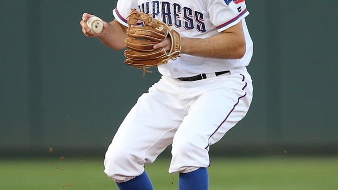 Express infielder Adam Rosales, shuffled between the Texas Rangers and Oakland A’s four times in a two-week span last summer, provided the key hit in Round Rock’s 4-2 win Sunday. CREDIT: Jamie Harms/for American-Statesman