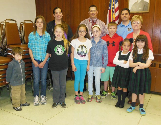 On hand for the recognition of the top contributors to a recent food drive for local food pantries are, from left, front, Logan Mielcarski, a future contributor; and top contributors Abigail Stapf, Victoria Stapf, Megan Munch, Olivia Bongiorno, Nicholas Oriole, Marisol Gadziala and Bailee Smith and, back, Heather Wheeler-Stapf, of Herkimer Elementary School, Eric Moreau, of Frankfort-Schuyler, Rob Watson, of Central Valley, and Sr. Rosalie Kelley, of St. Francis de Sales Regional Catholic School. TELEGRAM PHOTO/DONNA THOMPSON