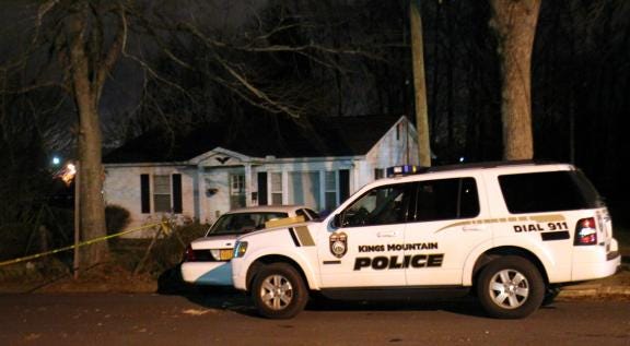 Kings Mountain Police investigate a murder on Phenix Street on Jan. 4, 2014. An autopsy report revealed how badly Donald Lovette was beaten.
