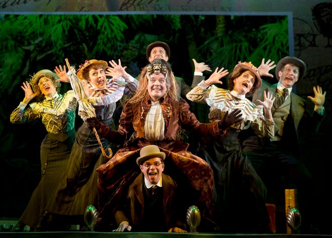 This undaed file theater image released by The O+M Company Jefferson Mays, center, during a performance of "A Gentleman's Guide to Love and Murder," at the Walter Kerr Theatre in New York. The musical romp in which a poor man comically eliminates the eight heirs ahead of him for a title nabbed a leading 10 Tony Award nominations on Tuesday, April 29, 2014. (AP Photo/The O+M Company, Joan Marcus, File)