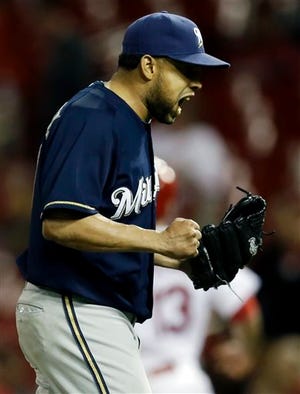 Milwaukee Brewers relief pitcher Francisco Rodriguez celebrates after getting St. Louis Cardinals' Matt Carpenter to line out to end a baseball game Tuesday, April 29, 2014, in St. Louis. The Brewers won 5-4 in 11 innings.