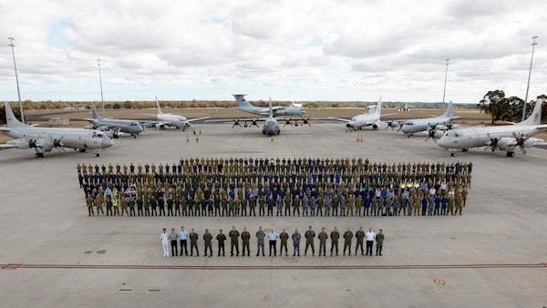 In this aerial photo taken April 29, 2014, supplied by the Australia Defence Force personnel and Multinational aircraft involved in operation "Southern Indian Ocean", are assembled for a photo at RAAF Base Pearce, in Perth, Western Australia. Seven nations including Australia, New Zealand, The U.S. Korea, Malaysia, China and Japan flew daily missions out to the Southern Indian Ocean conducting aerial search for the missing Malaysia Airlines Flight MH370, making it the largest maritime search operation in history. THE ASSOCIATED PRESS