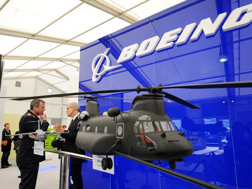 A representative from Boeing discusses his company at the 2012 Berlin Air Show. Local representatives plan to attend this year’s show in May to meet with aerospace companies about doing business in Northwest Florida.