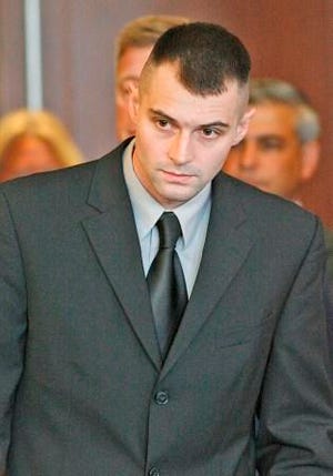 Massachusetts State Trooper John Basler of Kingston appears in Plymouth District Court on Thursday, Oct. 10, 2013, to face drunk driving charges after an accident in Plymouth left two Carver women dead Sept. 22.