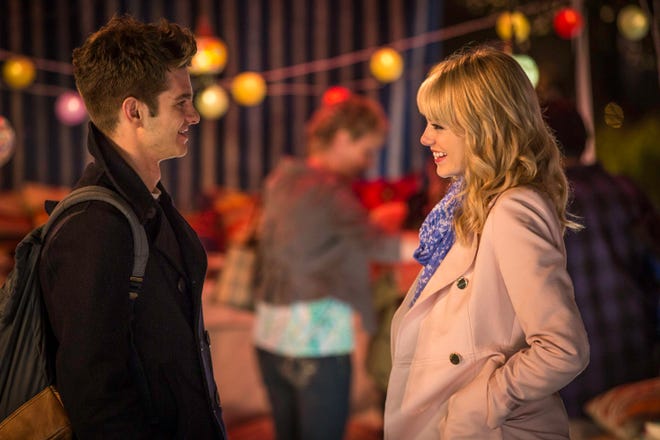 This image released by Sony Pictures shows Andrew Garfield and Emma Stone in "The Amazing Spider-Man 2." (Columbia Pictures - Sony Pictures, Niko Tavernise)
