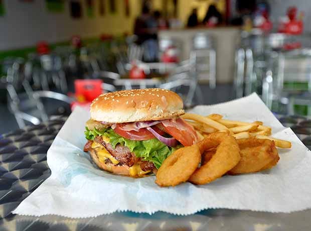 Cali Burger Bar & Grill in Hope Mills has it's burger named after the restaurant. The Cali Burger is made with grilled ham, bacon, american cheese, lettuce, tomato,onions, pineapple, special sauce and potato chips.